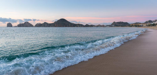 Sunrise on Medano Beach, on the coast of Cabo San Lucas, Mexico