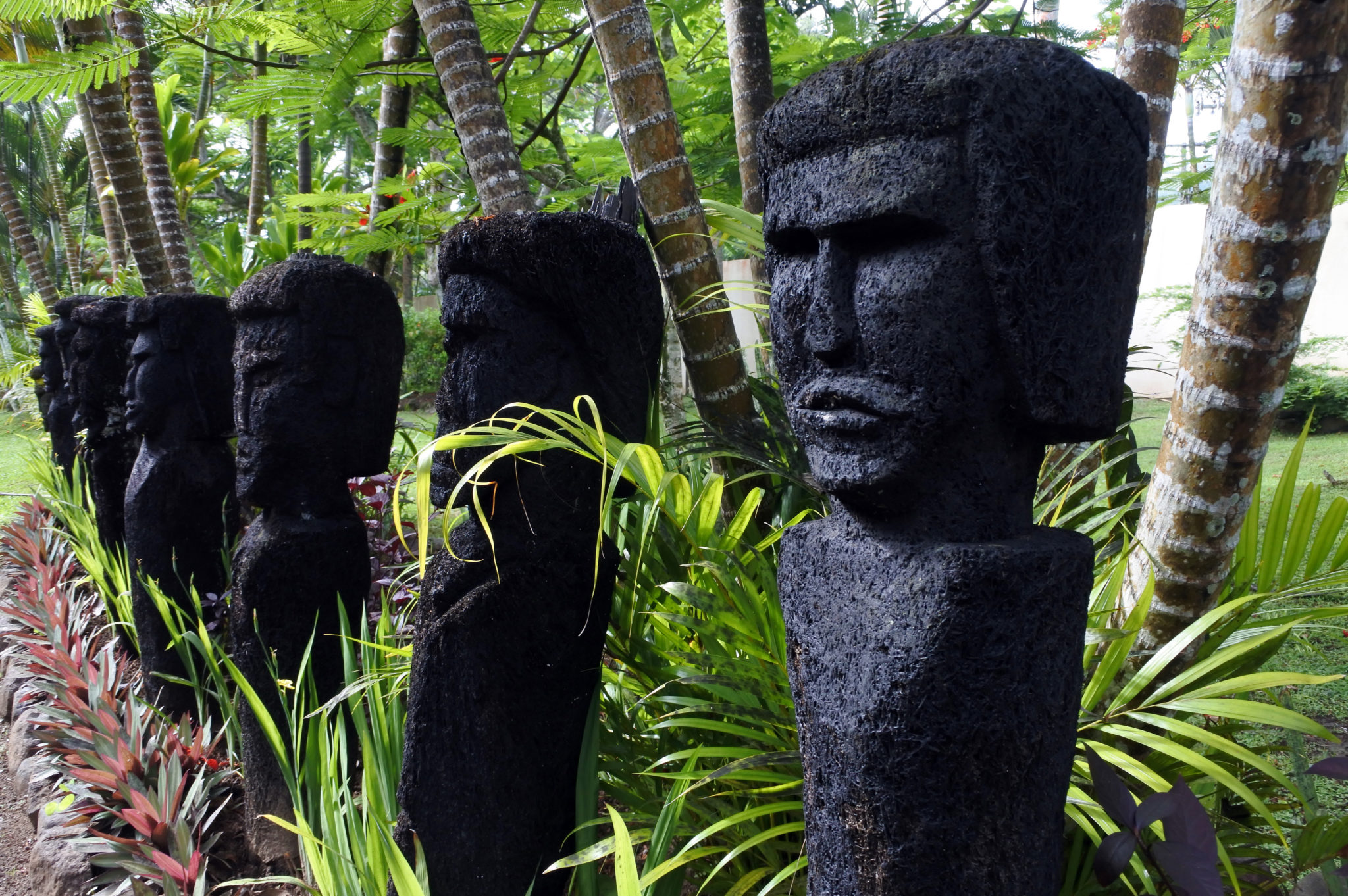 Row of totems on a Fiji yacht charter
