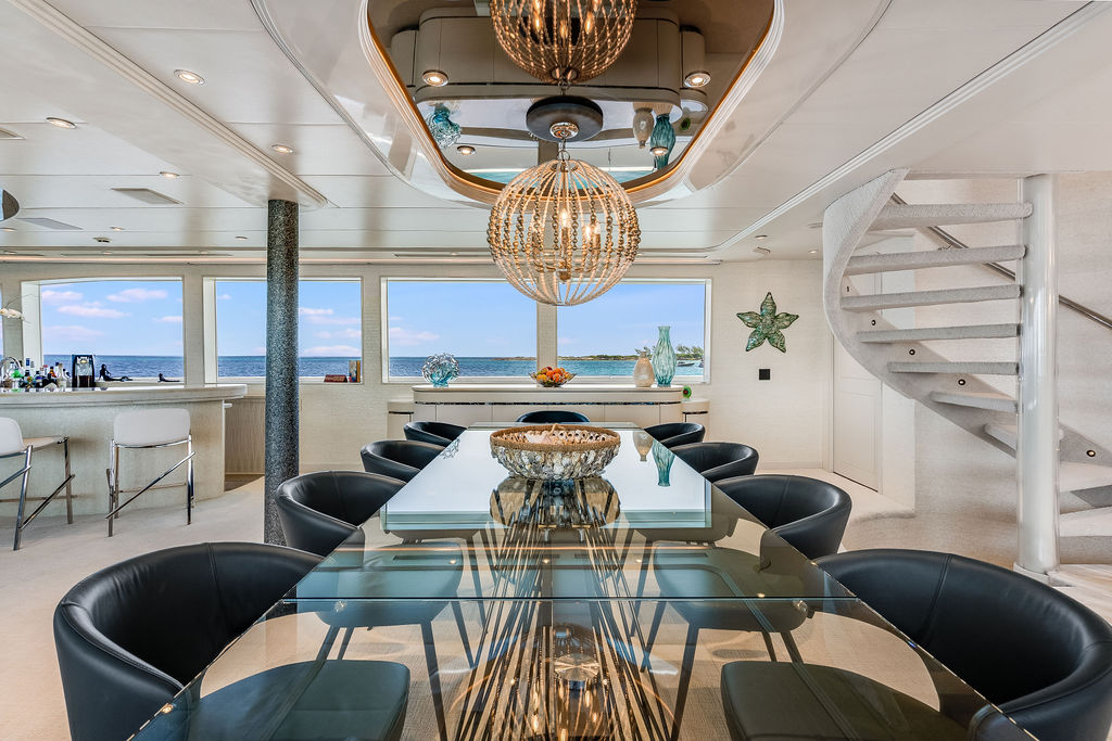 Dining area of CUPCAKE 132 foot Westship yacht for charter