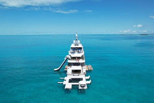 Starboard-aft profile of TOP FIVE II 200 foot Royal Hakvoort yacht for charter in the Bahamas