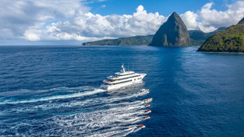 Running profile of TOP FIVE II, a 200-foot Royal Hakvoort yacht for charter in The Bahamas. The perfect yacht for a winter yacht charter.