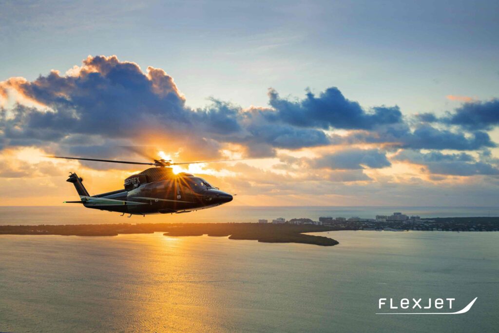 Flexjet Sikorsky S-76 Helicopter flying over the Intracoastal Waterway