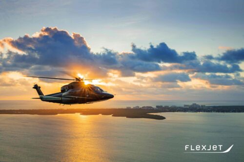 Flexjet Sikorsky S-76 Helicopter flying over the Intracoastal Waterway
