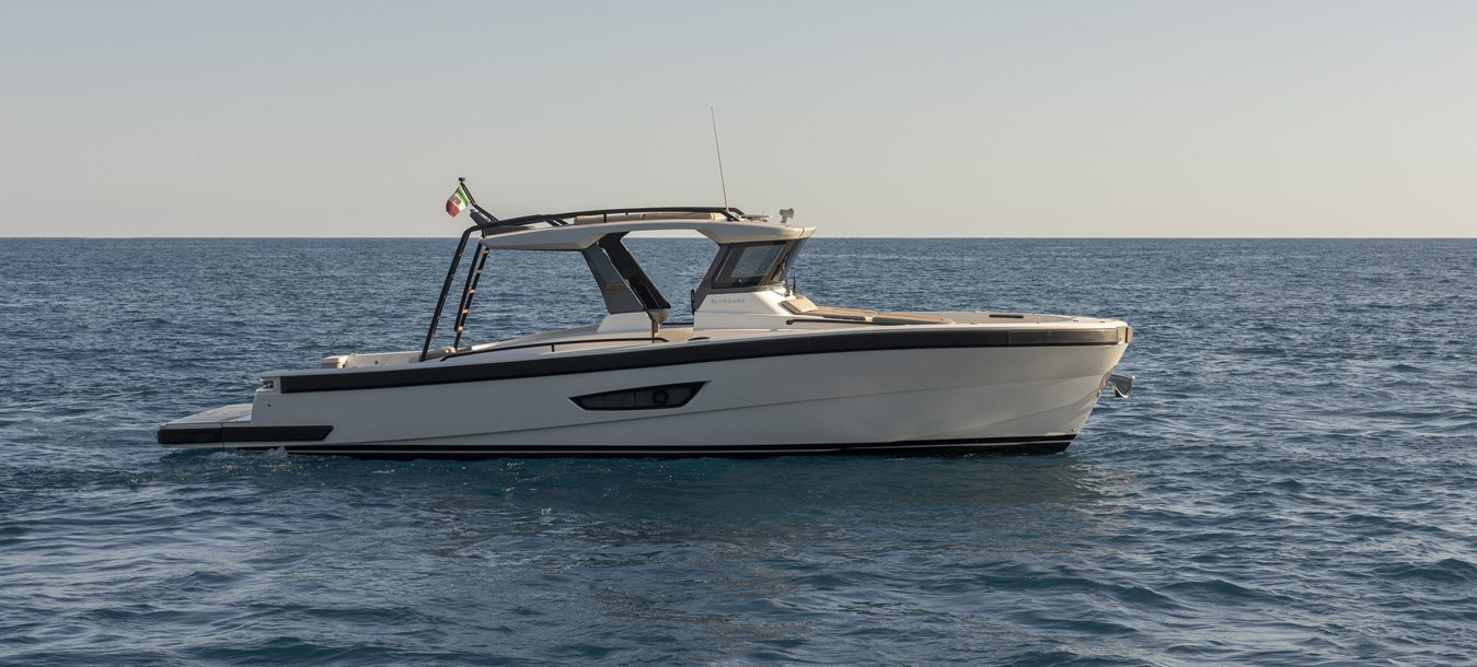 Profile of the BG42, a 43′ Bluegame yacht for sale with twin Volvo IPS engines, two staterooms, a galley and a large deck for entertaining.