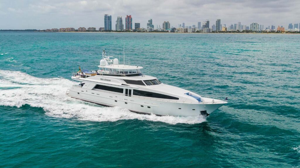 Running profile of RISK & REWARD, a 120 foot Crescent yacht for charter.