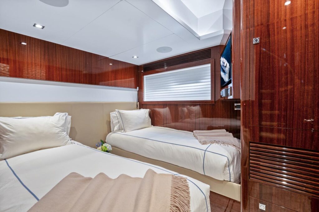 Guest stateroom of PILOT LOUNGE, a 91-foot Horizon yacht for charter in Florida and The Bahamas.