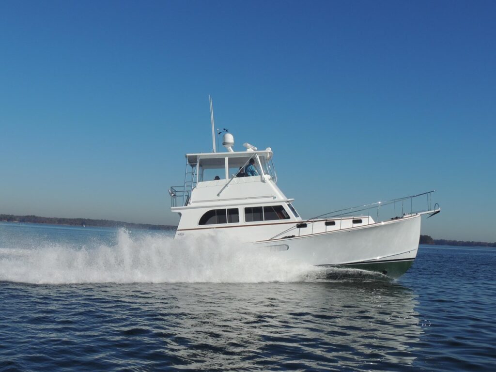 Profile of NORUMBEGA, a custom 43′ Lowell Brothers Downeast yacht for sale with top-tier equipment and luxurious Maine-built finishes.