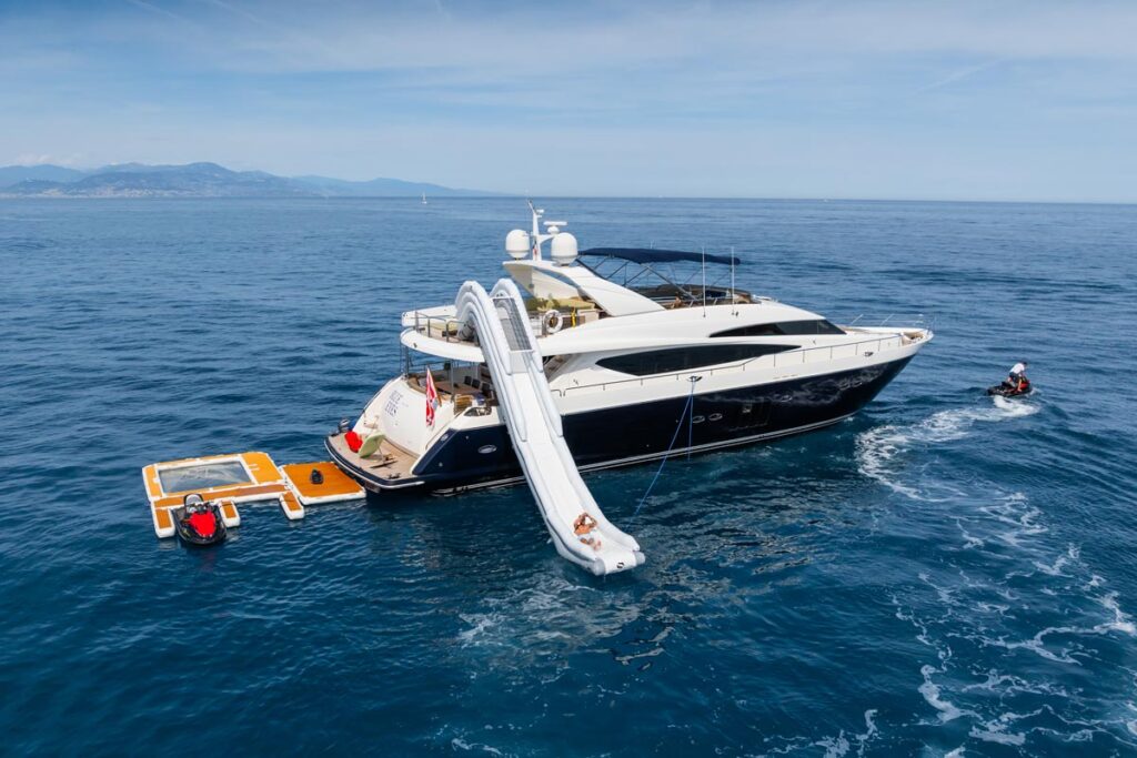 Aft profile of BLUE EYES, a 96-foot Princess yacht for charter in the West Mediterranean.