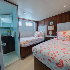 Guest stateroom of SOVEREIGN, a 100' Burger yacht for charter in the Dominican Republic.