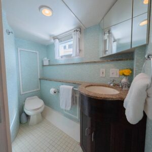 Guest ensuite of SOVEREIGN, a 100' Burger yacht for charter in the Dominican Republic.