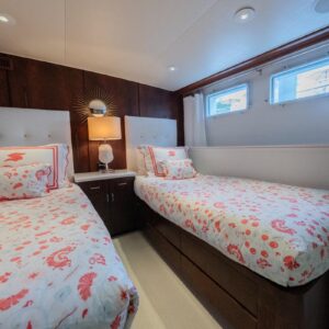 Guest stateroom of SOVEREIGN, a 100' Burger yacht for charter in the Dominican Republic.