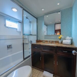 Guest ensuite of SOVEREIGN, a 100' Burger yacht for charter in the Dominican Republic.