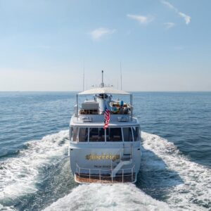 Aft profile of SOVEREIGN, a 100' Burger yacht for charter in the Dominican Republic.