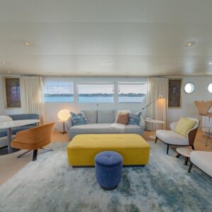 Main salon of SOVEREIGN, a 100' Burger yacht for charter in the Dominican Republic.