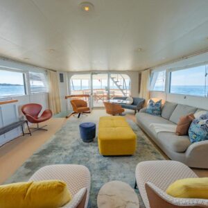 Main salon of SOVEREIGN, a 100' Burger yacht for charter in the Dominican Republic.