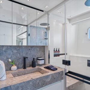 Guest stateroom ensuite of SWEET VIRGINIA, a 96′ Sanlorenzo yacht for charter in The Bahamas.