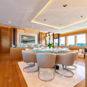 Main dining of DB9, a 171 foot Palmer Johnson yacht for charter in the Mediterranean.