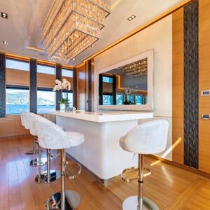 Main bar of DB9, a 171 foot Palmer Johnson yacht for charter in the Mediterranean.