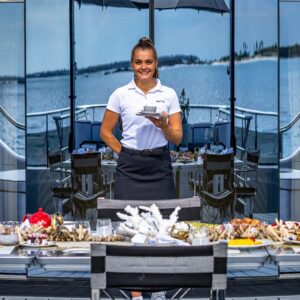 Al fresco dining aboard OKTO, a 218 foot ISA yacht for charter in the Mediterranean.