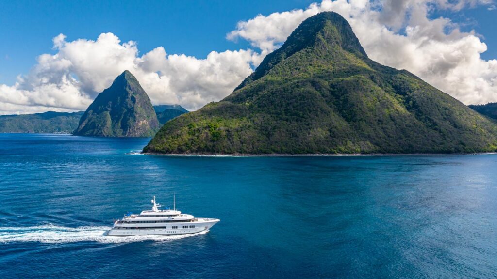 Running profile of TOP FIVE II, a 200-foot Royal Hakvoort yacht for charter in The Bahamas and Caribbean.