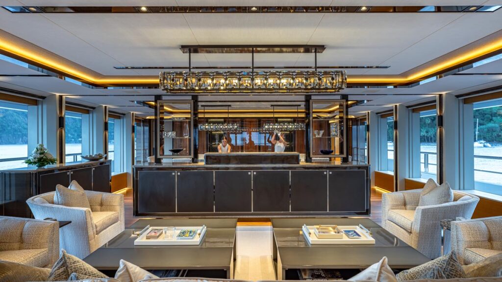 Main salon of TOP FIVE II, a 200-foot Royal Hakvoort yacht for charter in The Bahamas and Caribbean.