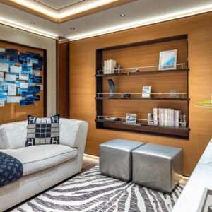 Lounge aboard TOP FIVE II, a 200-foot Royal Hakvoort yacht for charter in The Bahamas and Caribbean.