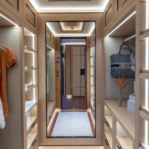 Master stateroom closet aboard TOP FIVE II, a 200-foot Royal Hakvoort yacht for charter in The Bahamas and Caribbean.