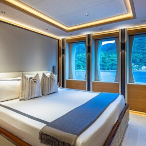 Guest stateroom of TOP FIVE II, a 200-foot Royal Hakvoort yacht for charter in The Bahamas and Caribbean.