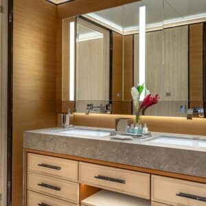 Guest stateroom ensuite of TOP FIVE II, a 200-foot Royal Hakvoort yacht for charter in The Bahamas and Caribbean.