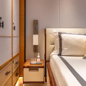 Guest stateroom of TOP FIVE II, a 200-foot Royal Hakvoort yacht for charter in The Bahamas and Caribbean.