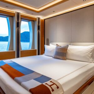 Guest stateroom of TOP FIVE II, a 200-foot Royal Hakvoort yacht for charter in The Bahamas and Caribbean.