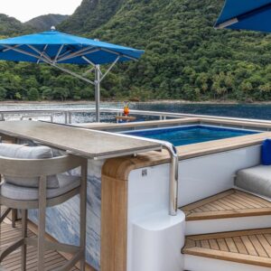 Pool aboard TOP FIVE II, a 200-foot Royal Hakvoort yacht for charter in The Bahamas and Caribbean.