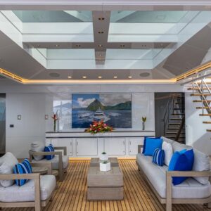 Outdoor lounge aboard TOP FIVE II, a 200-foot Royal Hakvoort yacht for charter in The Bahamas and Caribbean.