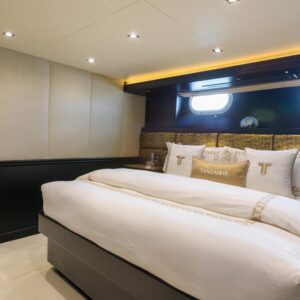 Guest stateroom of TANZANITE, a 145 foot Westship yacht for charter.