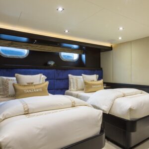Guest stateroom of TANZANITE, a 145 foot Westship yacht for charter.