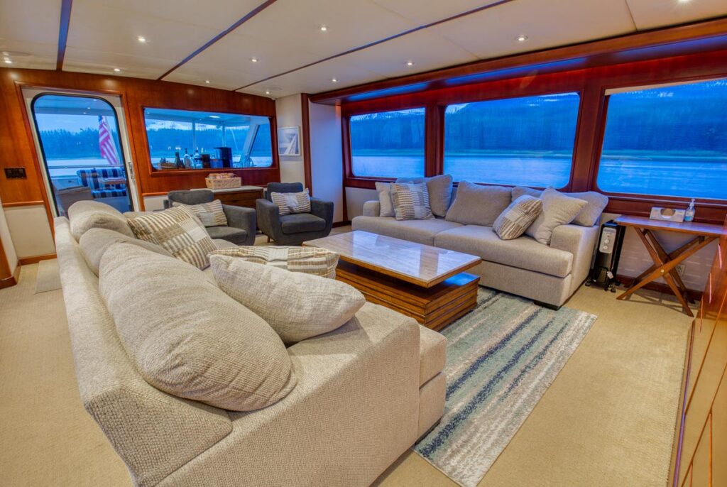 MY LADY ALASKA - Main salon of LADY ALASKA, a 97 foot Broward yacht for charter in Alaska.