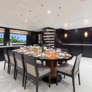 Main dining of TANZANITE, a 145 foot Westship yacht for charter.