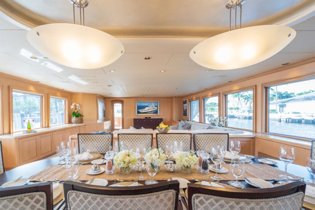Main dining of CHANSON, a 120 foot Christensen yacht for charter in The Bahamas.