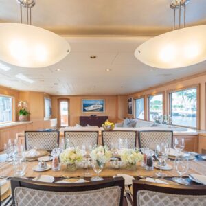 Main dining of CHANSON, a 120 foot Christensen yacht for charter in The Bahamas.