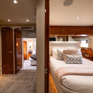 Guest stateroom of INDY, an 85 foot Hatteras yacht for charter in New England.