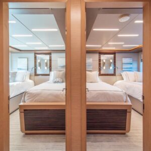 Guest stateroom of VOYAGER, a 90 foot Ocean Alexander yacht for charter in the Pacific Northwest.