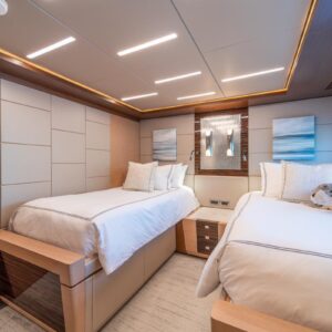 Guest stateroom of VOYAGER, a 90 foot Ocean Alexander yacht for charter in the Pacific Northwest.