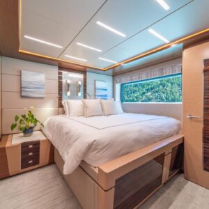 Guest stateroom of VOYAGER, a 90 foot Ocean Alexander yacht for charter in the Pacific Northwest.