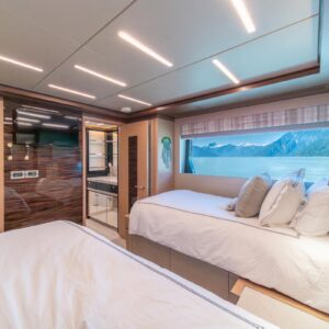 Guest stateroom of VOYAGER, a 90 foot Ocean Alexander yacht for charter in the Pacific Northwest.