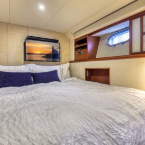 Guest stateroom of CHECKED OUT, a 65' Pacific Mariner yacht for charter in the Pacific Northwest.