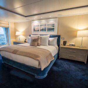 Master stateroom of JUBILEE, a 151 foot Pendennis yacht for charter in the Mediterranean.