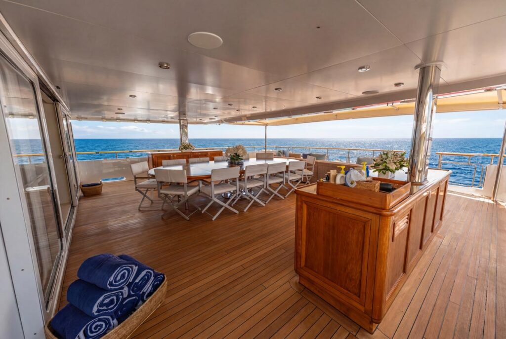 Aft deck of JUBILEE, a 151 foot Pendennis yacht for charter in the Mediterranean.