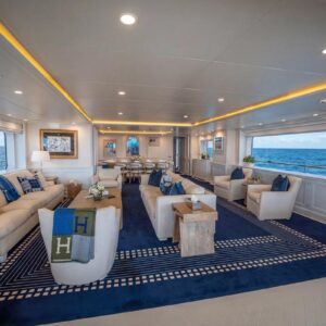 Main salon of JUBILEE, a 151 foot Pendennis yacht for charter in the Mediterranean.