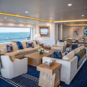 Main salon of JUBILEE, a 151 foot Pendennis yacht for charter in the Mediterranean.
