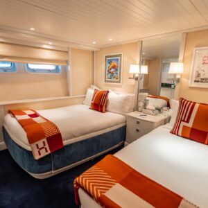 Guest stateroom of JUBILEE, a 151 foot Pendennis yacht for charter in the Mediterranean.